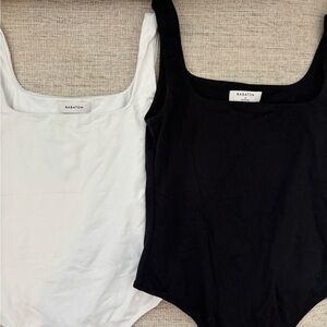 Babaton Black and White Bodysuits sold together